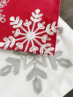 Fennco Styles Holiday Embroidered Snowflake Placemats 13" W x 19" L, Set of 4 - Red Festive Table Mats for Home Décor, Banquet, Family Gathering, Christmas and Special Occasion